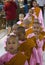 Little Girl Monk in a row