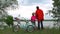 Little Girl with Mother Enjoying View of River