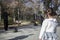 Little girl observes a juggler with crystal balls shows