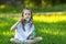 Little girl in Park blowing bubbles. Happy.