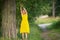 Little girl in a Park near a tree. Nature.