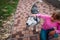 Little girl pet husky dog outside, dog therapy against anxiety