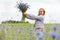 Little girl picking flowers