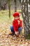 Little girl picking mushrooms. Fall concept.