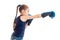 Little girl with pigtail stretches forward hand in Boxing Glove