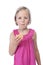 Little girl in pink eating a biscuit, isolated on white