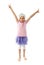 Little girl in pink shirt and purple skirt lifts hands up on whi