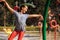 Little girl play with splashes on water playground