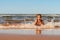 Little girl playing on the Brackley beach