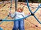 Little girl playing in a children playground.