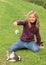 Little girl playing with a puppy