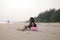 Little girl playing sandy on the beach