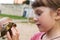 Little girl playing with turtle