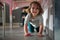 little girl playing under the table