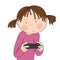 Little girl playing video games on game console, holding joystick, being very concentrated.