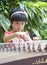 Little girl playing zither