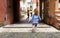 Little girl plays with her mother in a small and characteristic Italian village. San Felice Circeo, Lazio, Italy