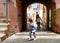 Little girl plays with her mother in a small and characteristic Italian village. San Felice Circeo, Lazio, Italy