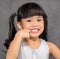 Little girl pointing teeth on white After brushing teeth feeling happy