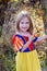 Little girl poses in her halloween princess costume