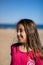 Little girl posing on the beach