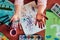 Little girl preschooler showing painted colourful hands