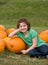 Little Girl in a Pumpkin Patch