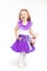 Little girl in a purple skirt