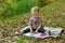 Little girl reading the alphabet