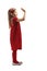 Little girl in a red dress greeting with hand