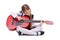 Little girl with red guitar, sitting