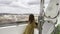 Little girl rides in a ferris wheel booth. Budapest, Hungary