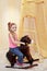 Little girl rocks on rocking horse