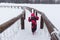 Little girl running across bridge