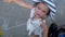 Little girl running on paving slabs pavement