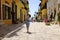 A little girl runs happily in the picturesque Italian village. San Felice Circeo, Lazio, Italy