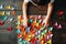 Little girl\\\'s hands cutting butterflies out of colored paper