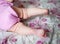 Little girl`s legs when she`s learning to crawl