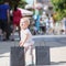 Little girl in shopping outlet village