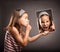 Little girl showing silence gesture