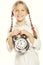 little girl with a silvered alarm-clock a isolated on a over wh