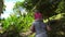 Little girl sitting piggiback on dad at steep stairs