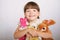 Little girl with soft toys