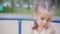 Little Girl Spinning Merry Go Round Carousel Amusement Park Playground Summer Day