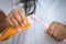 Little girl squeezes the toothpaste on the toothbrush