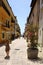 A little girl standing in the picturesque Italian village. San Felice Circeo, Lazio, Italy