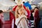 a little girl stands in the aisle of the plane. travel with children