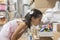 Little girl in store looking crafts material for homework