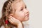 Little girl suffering from otitis