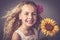 Little girl with a sunflower